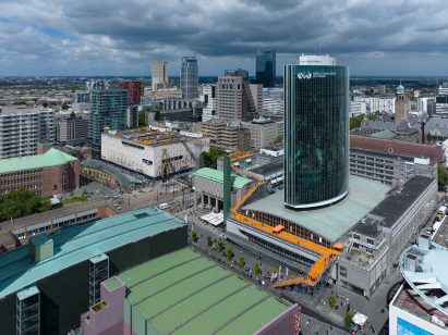 Aerial image of the orange Rotterdam Rooftop Walk