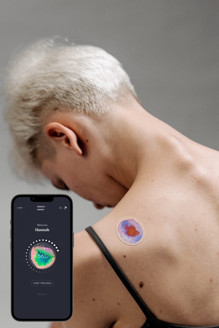 Photo of a woman's back wearing a psychedelic-patterned circular sticky patch with a phone screen showing related statistics