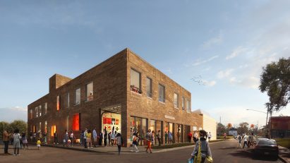 brick facade and people walking
