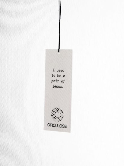 Circulose clothes tag reading "I used to be a pair of jeans"