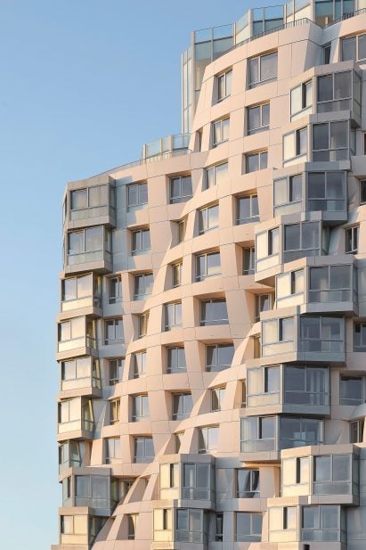 Rippled facade of Prospect Place by Frank Gehry