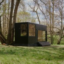 Exterior image of wood-lined cabin