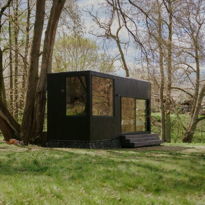 Exterior image of wood-lined cabin