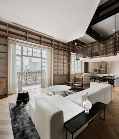 Book-lined apartment by Atelier Tao+C