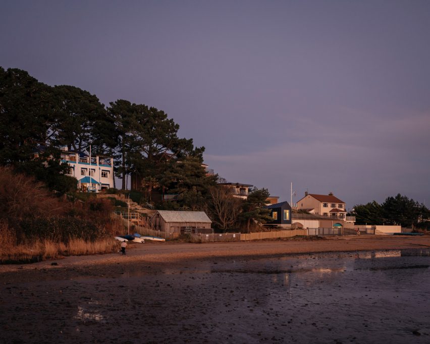 Night view of The Pottering Shed by Studio Mutt