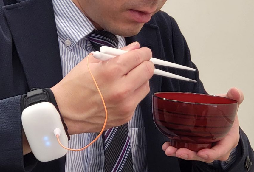 A man eating Miso with Taste-Adjusting Chopsticks