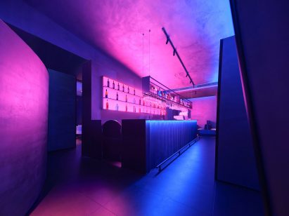 Taste of Dadong bar with fuchsia-pink drinks shelf