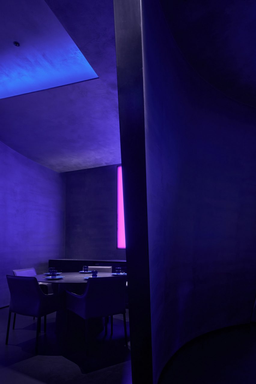 Curved partitions inside Shanghai's Taste of Dadong restaurant by AD Architecture