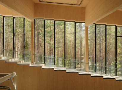 Stairs in Vestre factory with views out to forest