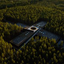 Birde-eye view of The Plus furniture factory by BIG for Vestre in a forest