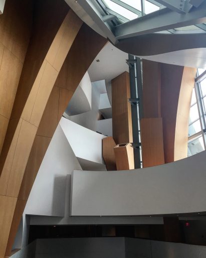 Curved theatre lobby by Frank Gehry