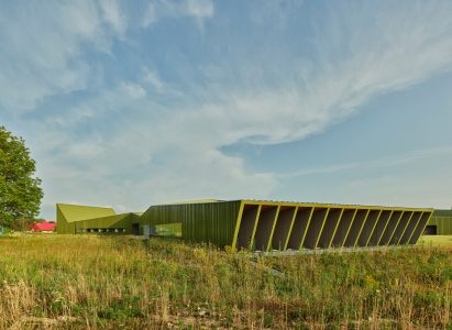 Low lying green building thaden