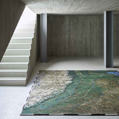 Large Ganges river rug in basement with staircase