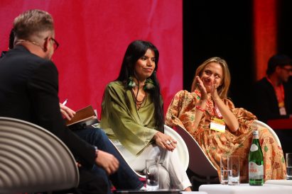 A photograph of the speakers at Therme Art's event on wellbeing