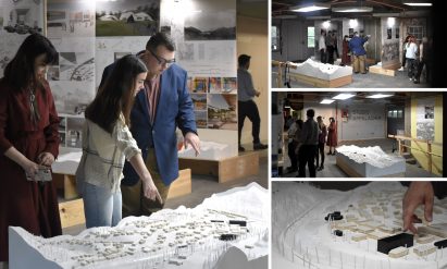 A photograph of students looking at an architectural model