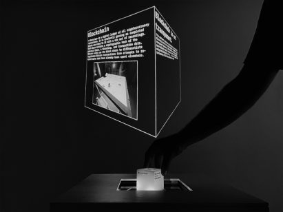 A photograph of an installation that explores blockchain