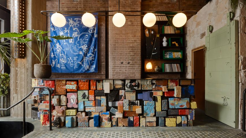 Lobby of Ace Hotel Sydney with multicoloured counter by Flack Studio