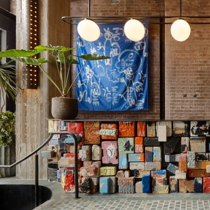 Lobby of Ace Hotel Sydney with multicoloured counter by Flack Studio