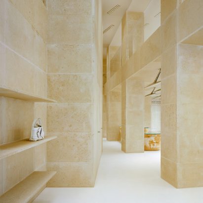 Interior image of Acne Studios limestone-clad Rue Saint Honoré store