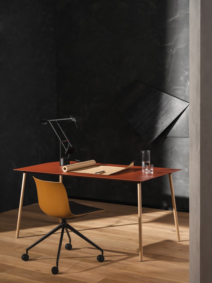 Arper's Aeeri table in red with oak legs