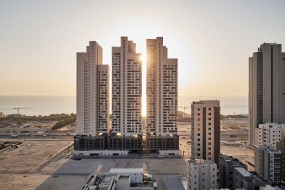 Tamdeen Square is pictured with the ocean in the distance