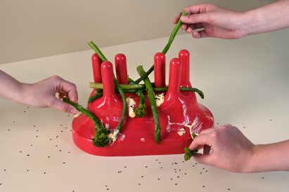 Red table centrepiece with food on