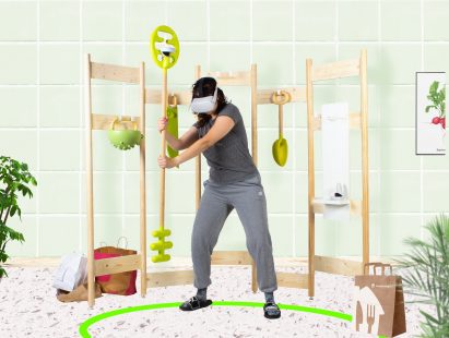 Person with a VR headset on playing with wooden tools