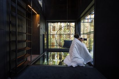 Black interior of room at Treehotel