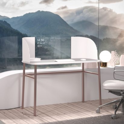 Caelum desk in white leant against a window framing surrounding mountain views