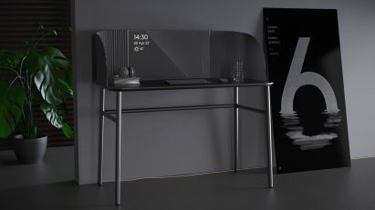 Caelum desk in black in a dark home interior with headphones on desktop