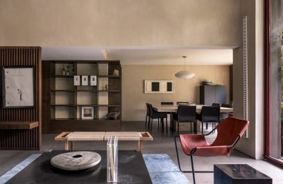 Ground floor living room with large bookshelf