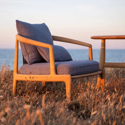 The Secret Garden armchair on a grassy area