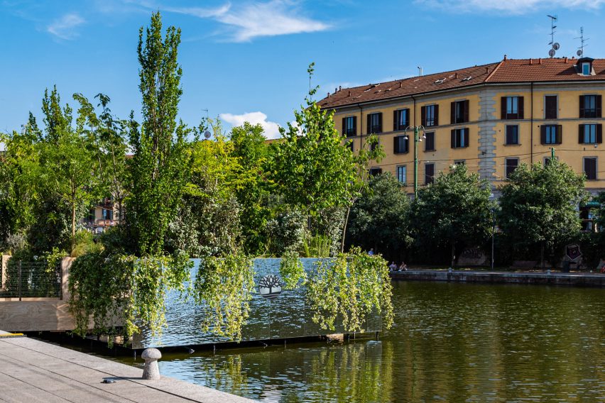 Floating garden filled with trees on a river