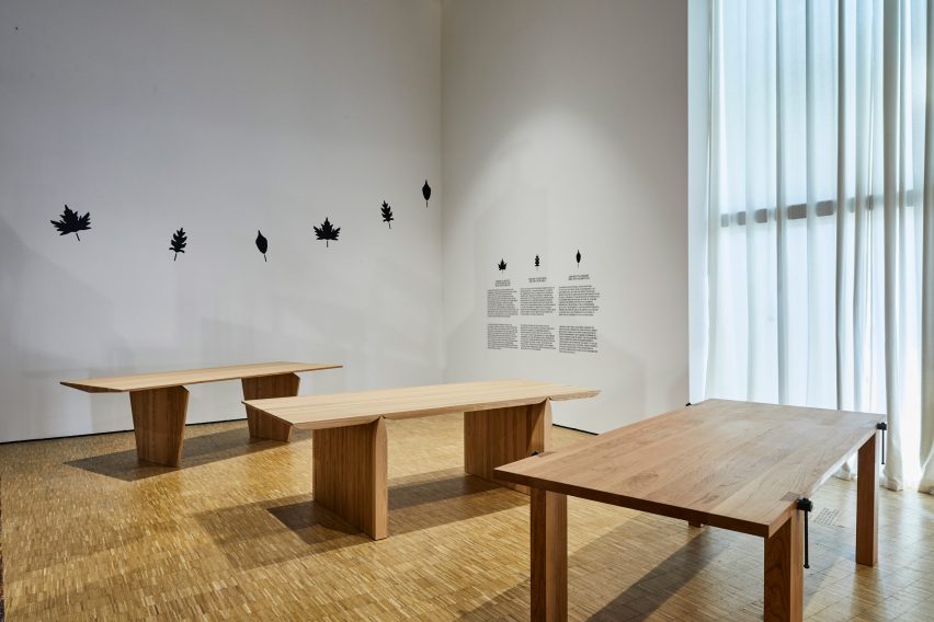 Wooden tables at Forest Tales exhibition