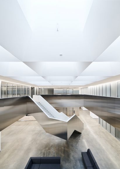 View of atrium with staircase and skylights