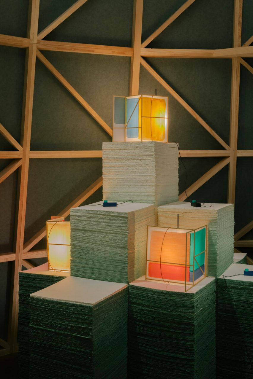 Paper lights on top of stacks of paper pulp