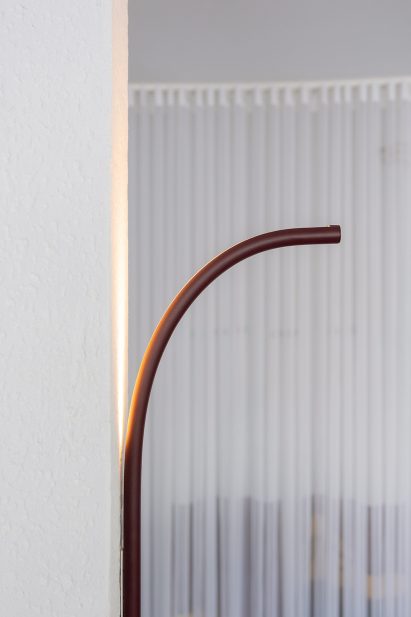 A photograph of a curved light designed by IKEA