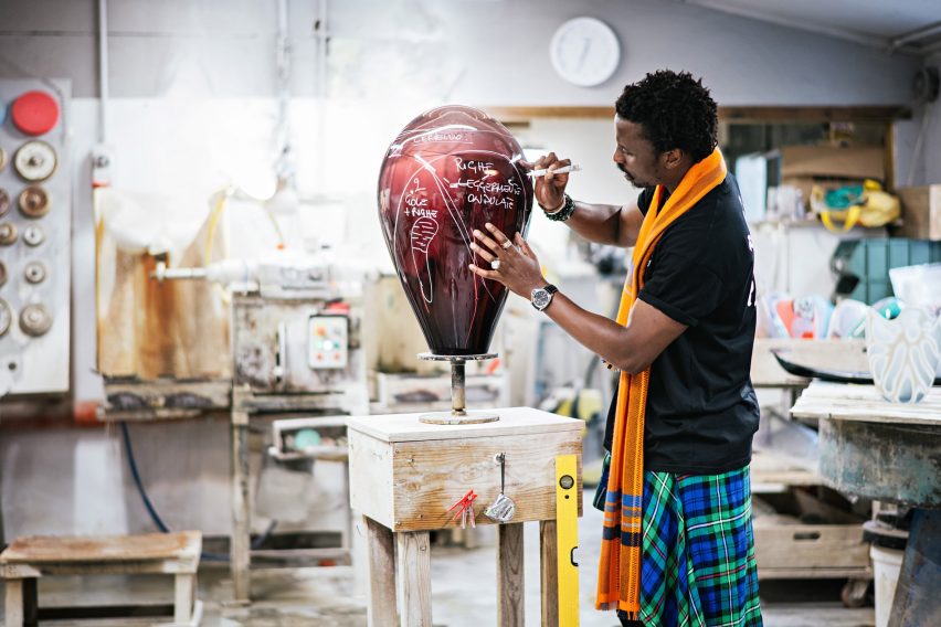 Ini Archibong in Murano with Gaea Pendant