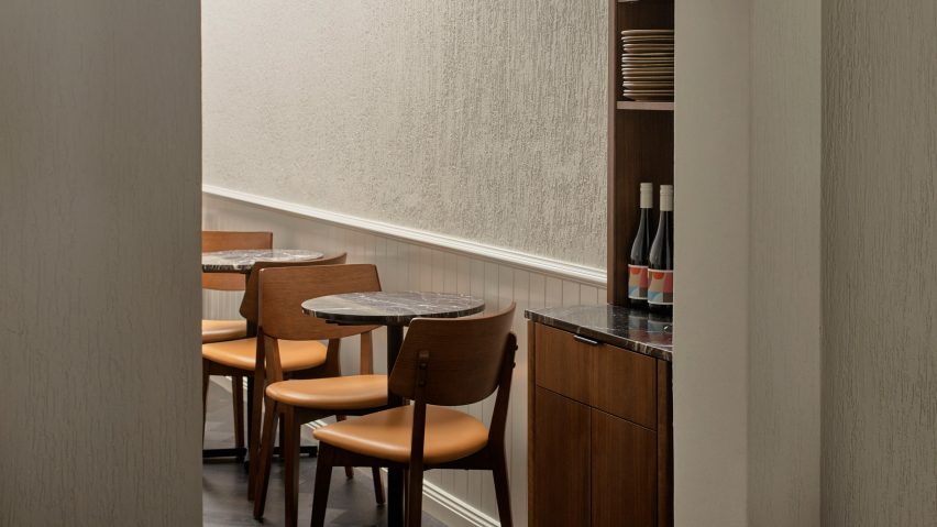 Dining tables and chairs in interior of Jane bar in Surry Hills, Sydney designed by Luchetti Krelle