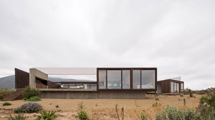 Juan Pablo Ureta orients wooden Chilean beach house around a courtyard