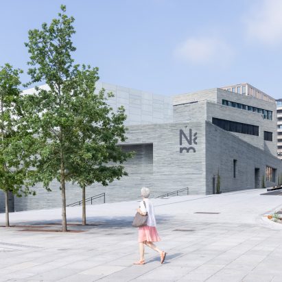 Person walking past the National Museum of Norway
