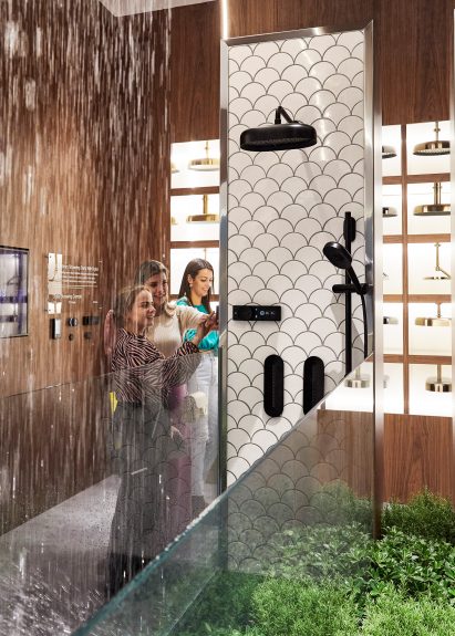 A photograph of people in the Kohler showroom