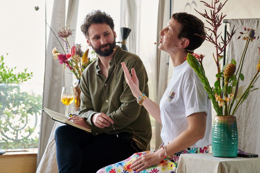Ben Hobson and Sarah Andelman in conversation on a rooftop
