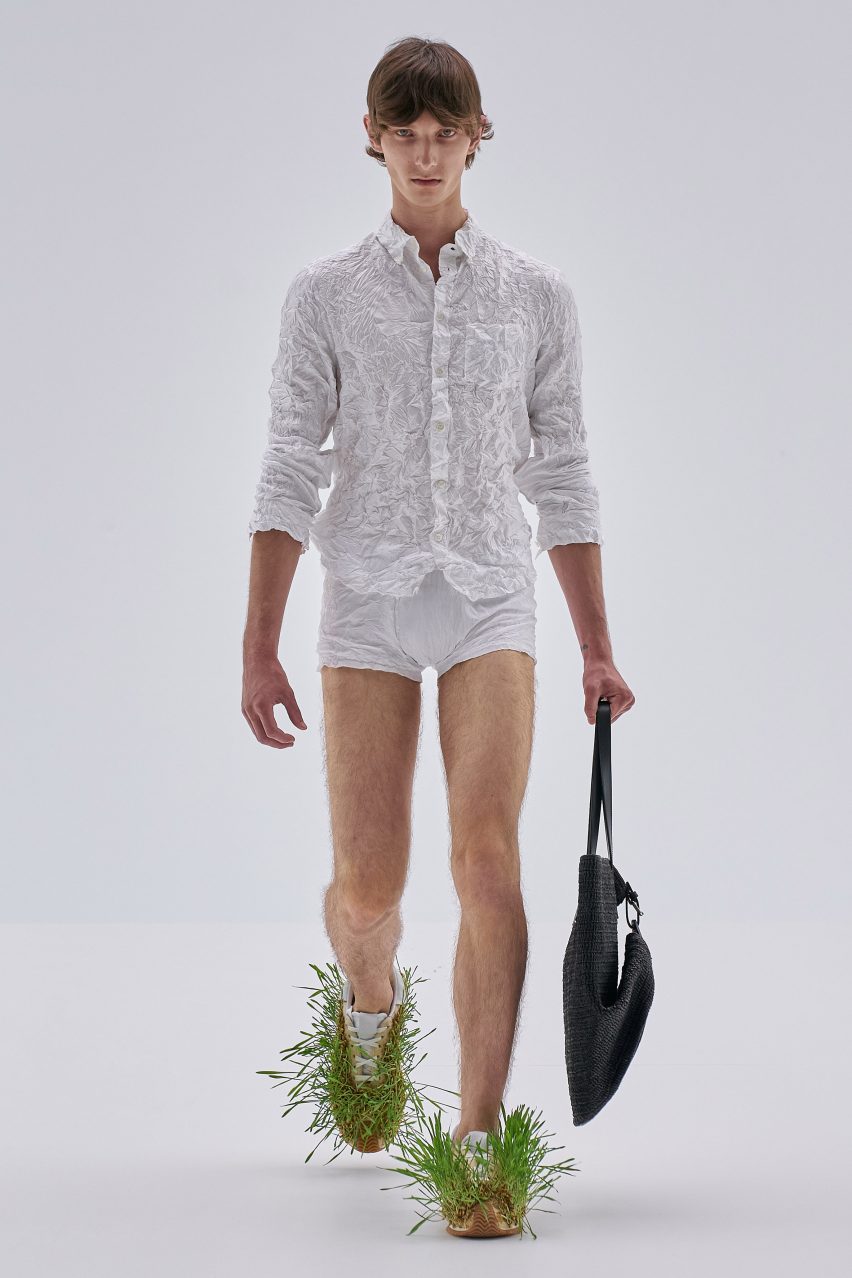 Loewe Spring Summer 2023 featured plants growing from shoes and screens fixed to coats