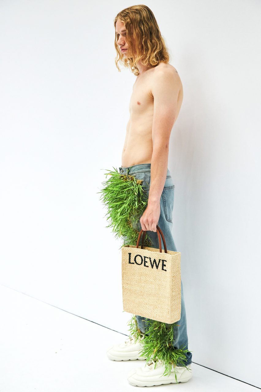 Loewe Spring Summer 2023 featured plants growing from shoes and screens fixed to coats
