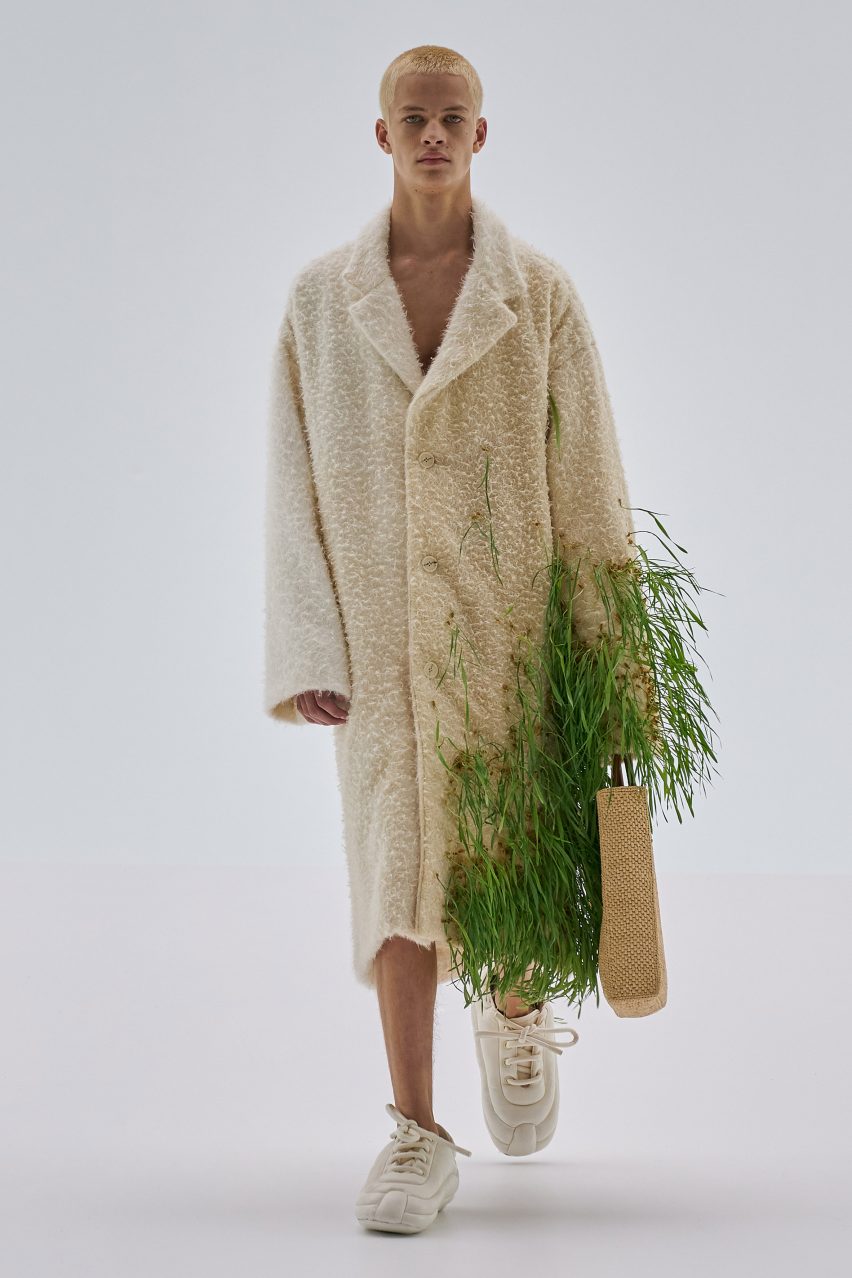 Loewe Spring Summer 2023 featured plants growing from shoes and screens fixed to coats
