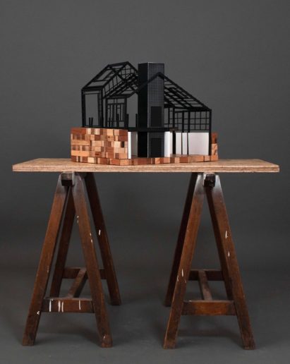 A photograph of a model of a farm