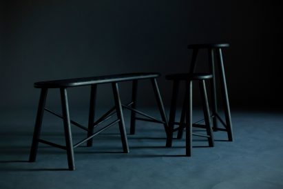 A photograph of a black furniture range