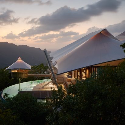 Studio of Environmental Architecture drapes sails over mountainside home in Bequia