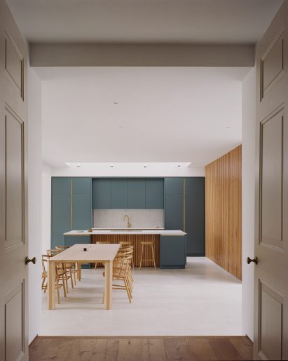 Kitchen with dusky blue cabinets